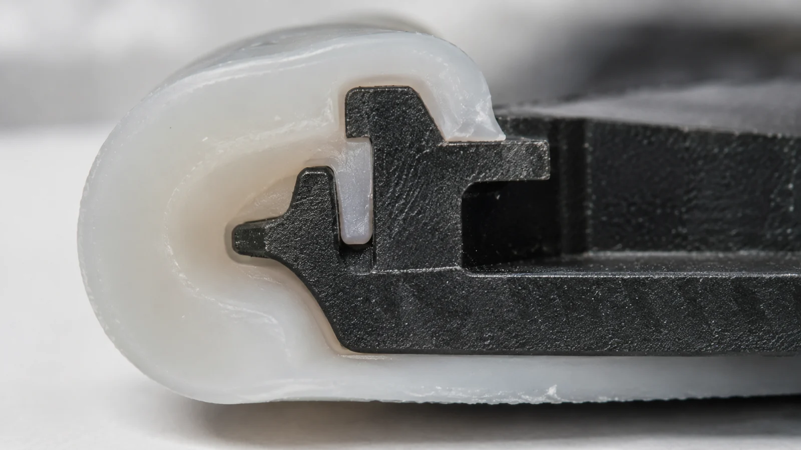 LSR retained around rigid substrate